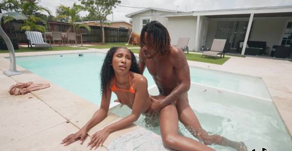 Aroused ebony goes very loud during outdoor pool porno with her new BF on ebonyporntube.net