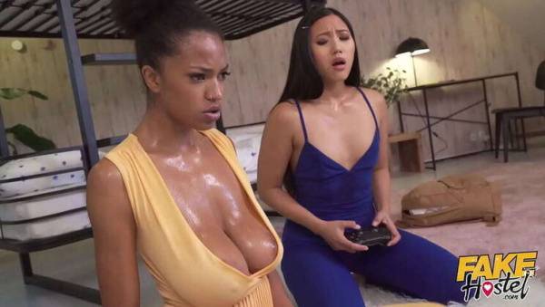 Asian Teen May & Ebony Babe Tina: Intense Gaming Leads to Sweaty Threesome on ebonyporntube.net